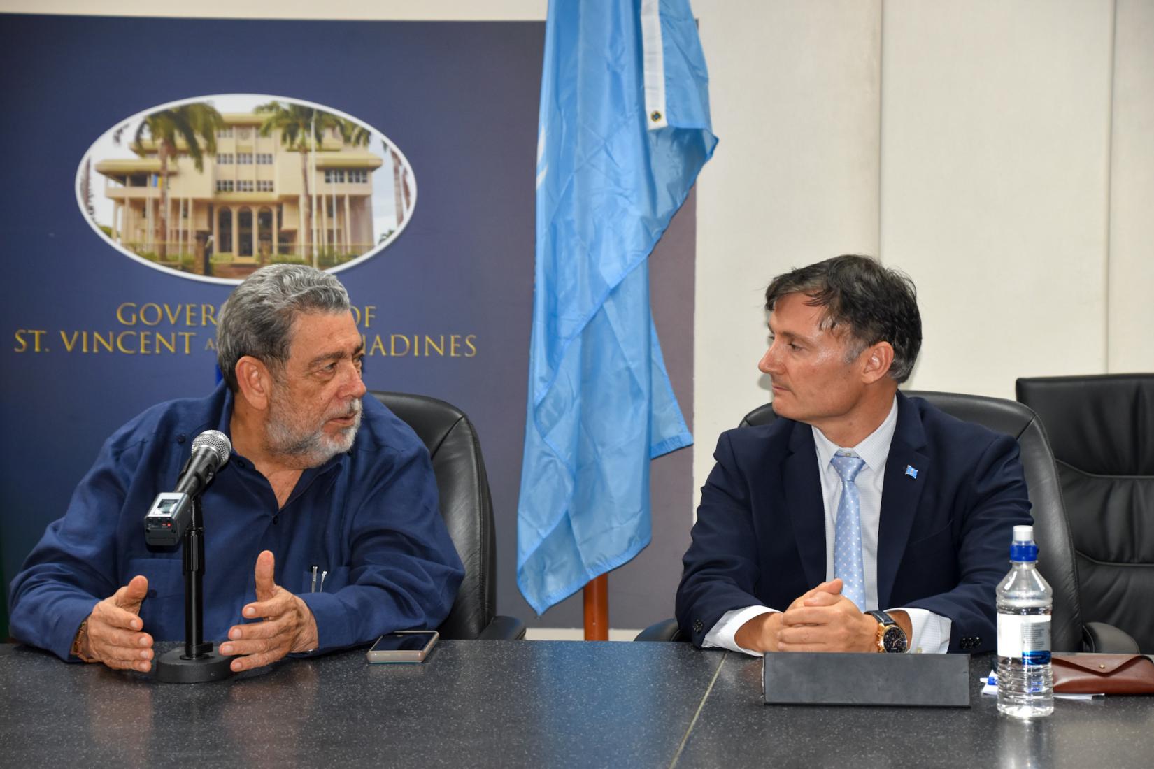 RC Trebucq and Prime Minister Dr. The Honourable Ralph Gonsalves chat moments before the signing of the CIP plan for St. Vincent and the Grenadines. 
