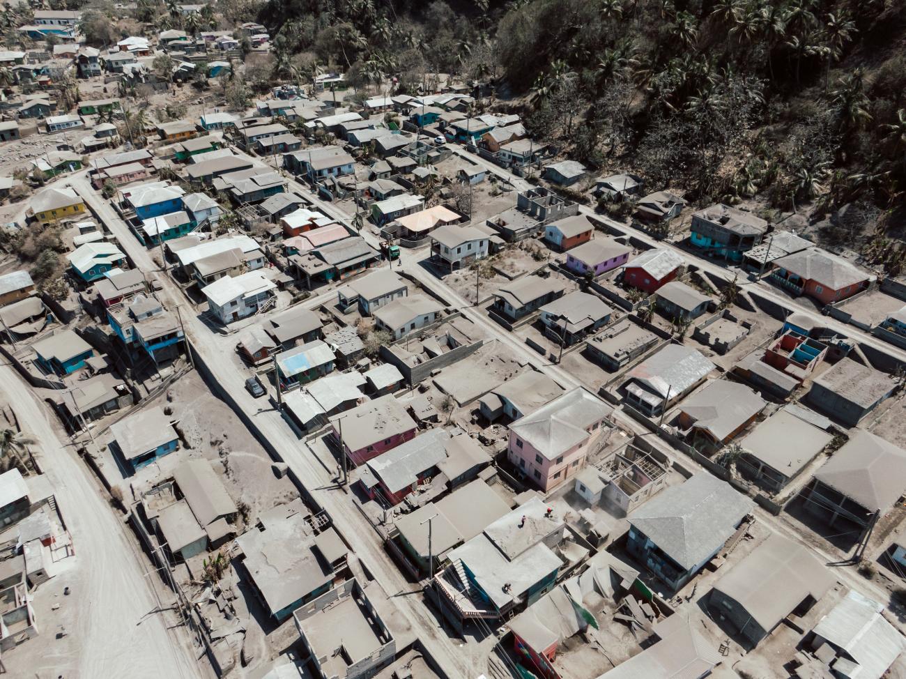 rows and rows of houses in St. Vincent from above, covered in Ash from the eruption of La Soufriere