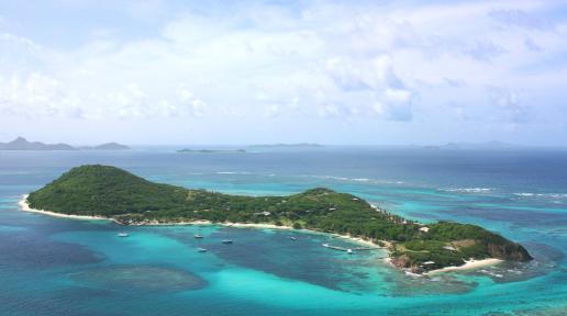 The private island resort Petit St. Vincent sits in crystalline waters rich in fish, corals and sponges.Credit...