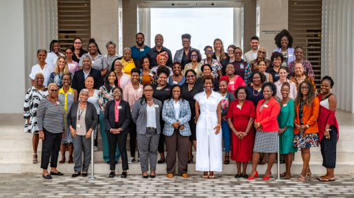 Tonni Brodber, Representative, UN Women Multi-Country Office (MCO) (Centre front) is joined by CSO participants that attended the Exchange. 