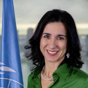 portrait of smiling woman in business wear 